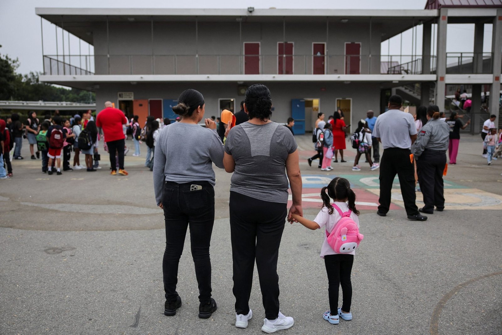 Photo: teachers and volunteers patular for the presence of ice