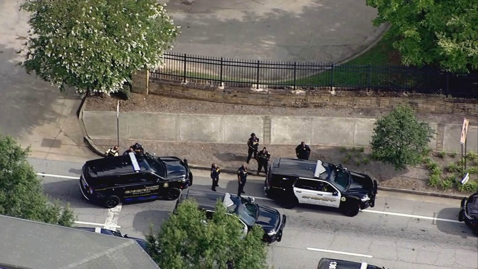 Wounded officer, suspected dead in shots near the headquarters of the CDCs and the University of Emory campus