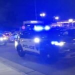 PHOTO: Several police vehicles sound sirens after reports of shots fired at Christmas Tree Lighting in Concord, North Carolina.